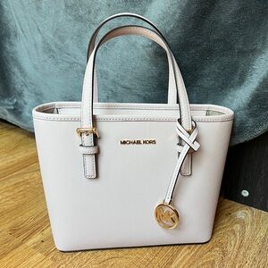 New Michael Kors small crossbody purse.
